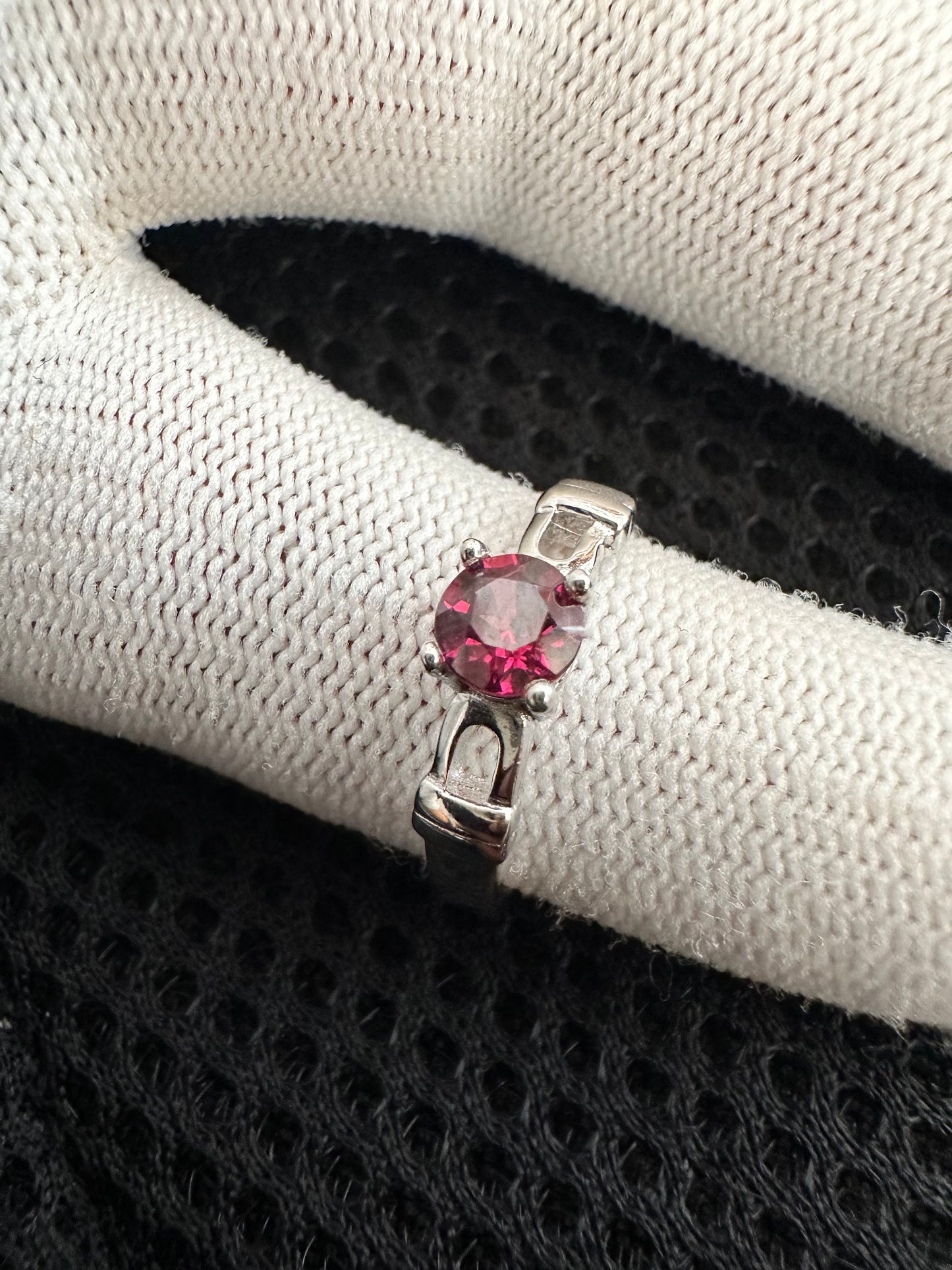 October's birthstone shines bright in this stunning silver ring with a Rubellite Tourmaline gemstone.