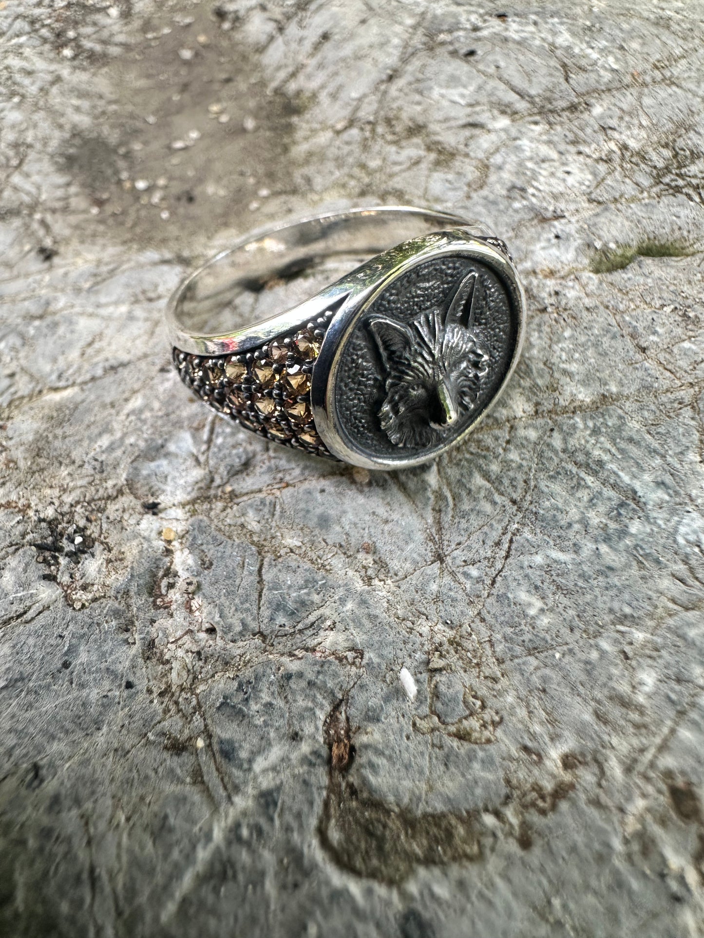 Bold 925 sterling silver wolf ring with radiant yellow sapphire—perfect unisex September birthstone jewelry symbolizing strength and clarity