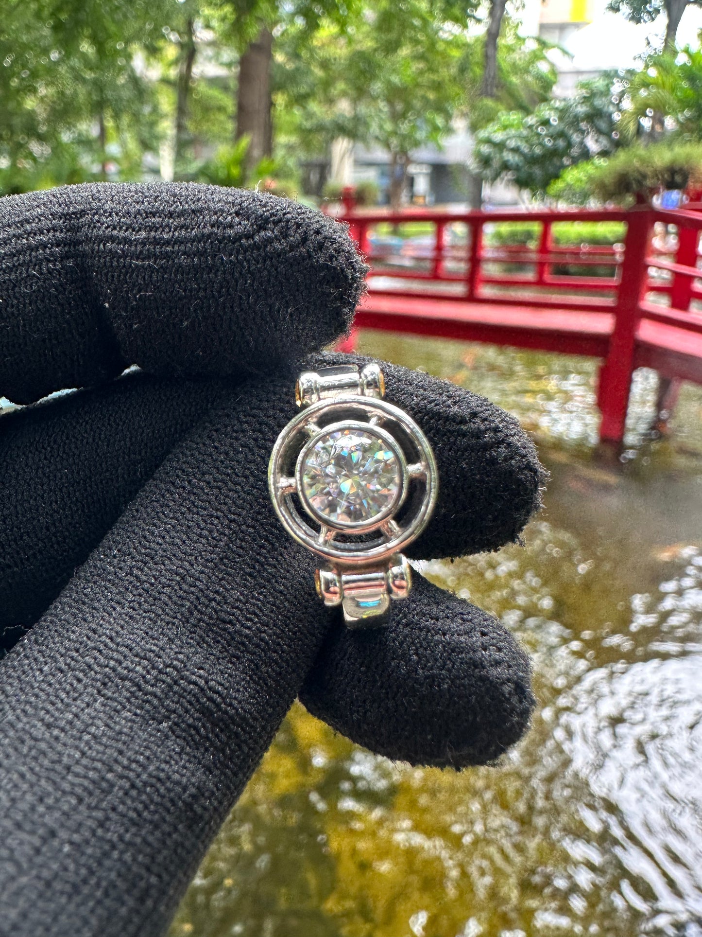 Elegant D Color Moissanite Ring with GRA Certificate, featuring a brilliant center stone complemented by vibrant yellow sapphire accent gems, set in polished 925 sterling silver – a luxurious and ethically sourced diamond alternative.