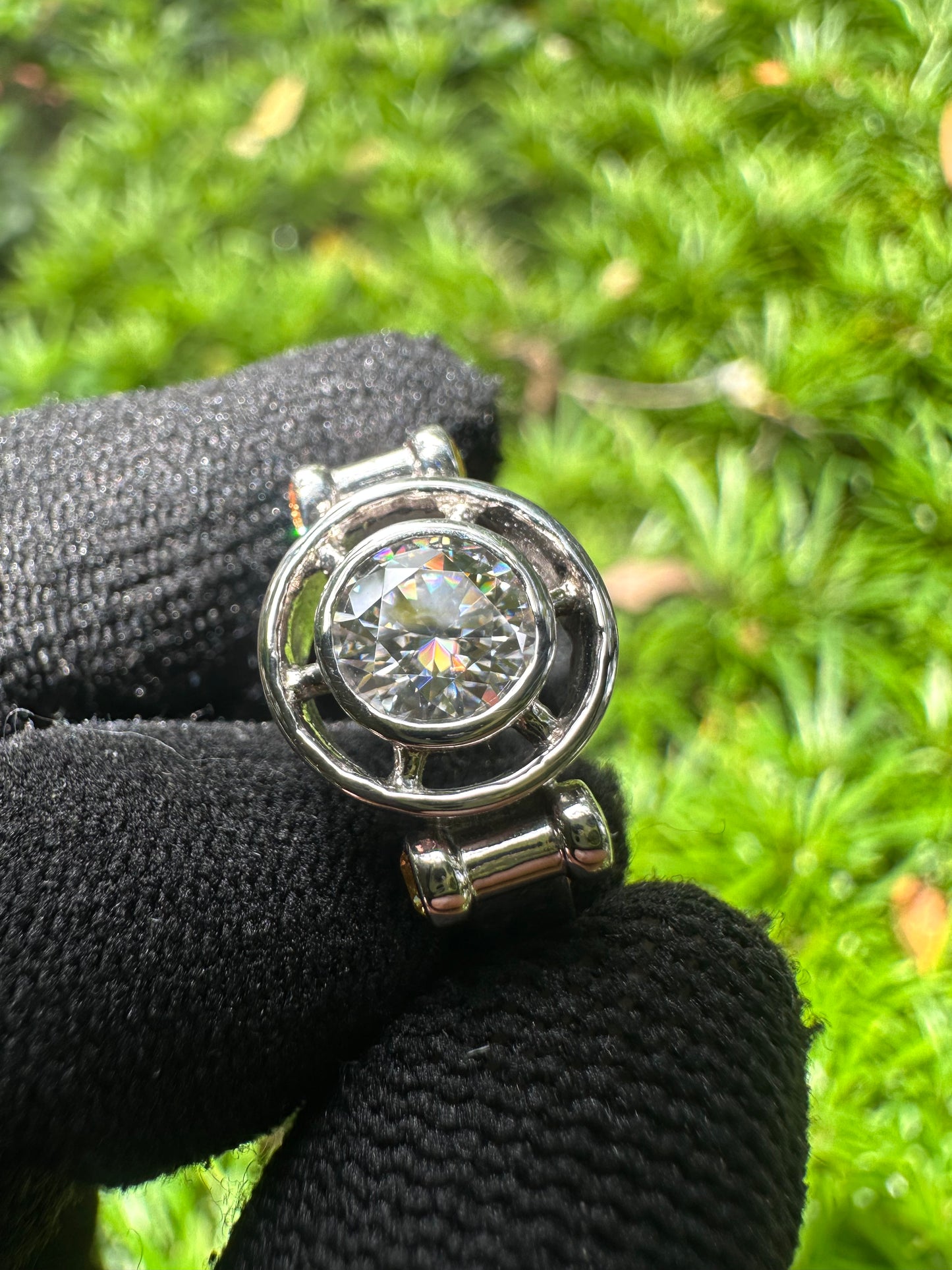 Elegant D Color Moissanite Ring with GRA Certificate, featuring a brilliant center stone complemented by vibrant yellow sapphire accent gems, set in polished 925 sterling silver – a luxurious and ethically sourced diamond alternative.