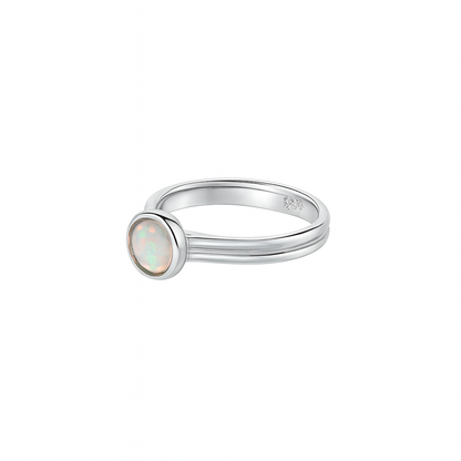 Ethiopian Opal women’s ring showcasing full fire and vibrant rainbow play-of-color, set in elegant sterling silver. October birthstone jewelry symbolizing hope, creativity, and emotional balance — perfect gift for her on any occasion.