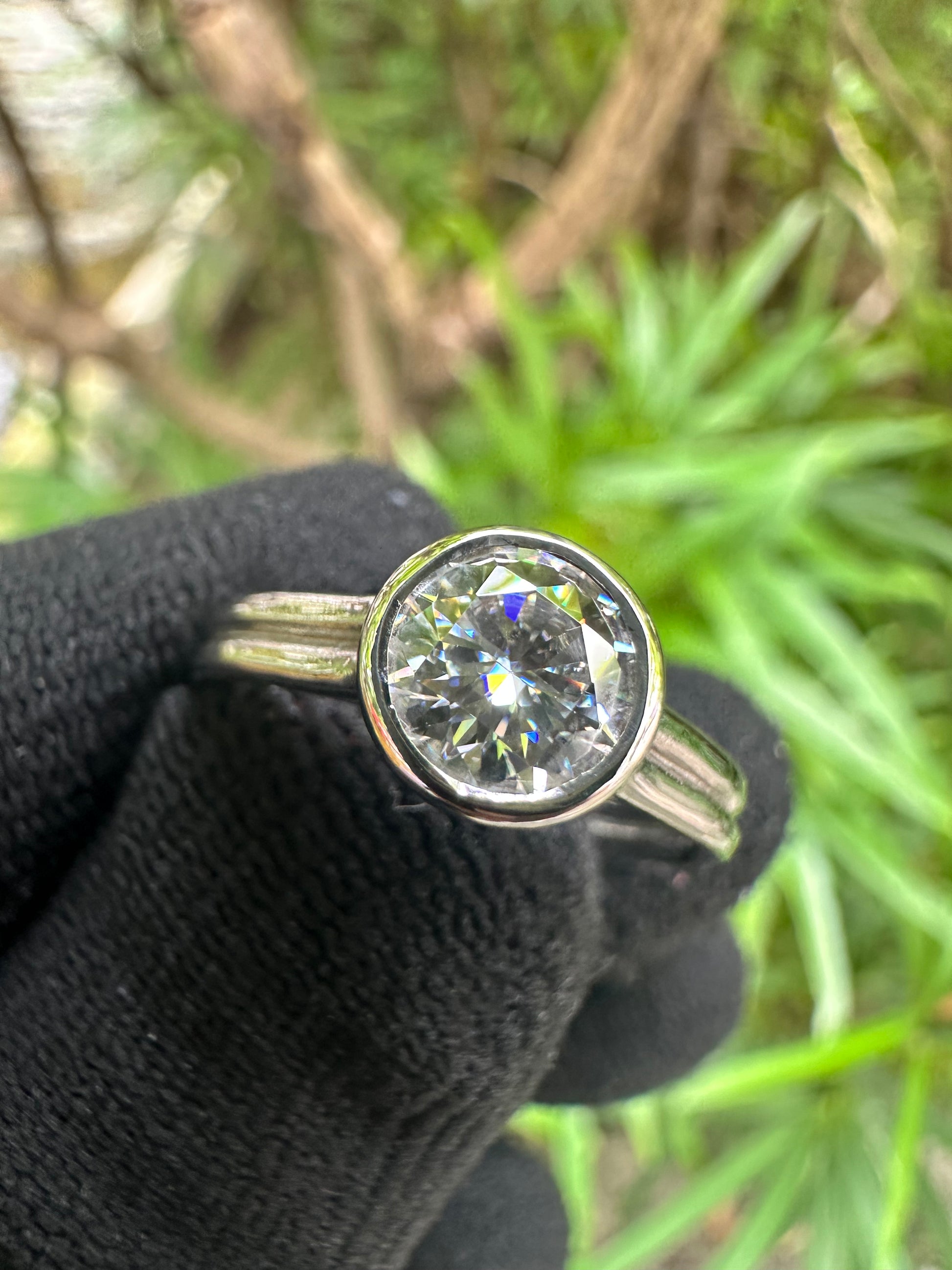 Shop this 1ct D Color Moissanite Solitaire Ring in S925 silver, white gold plated, GRA certified – perfect engagement or gift ring for her