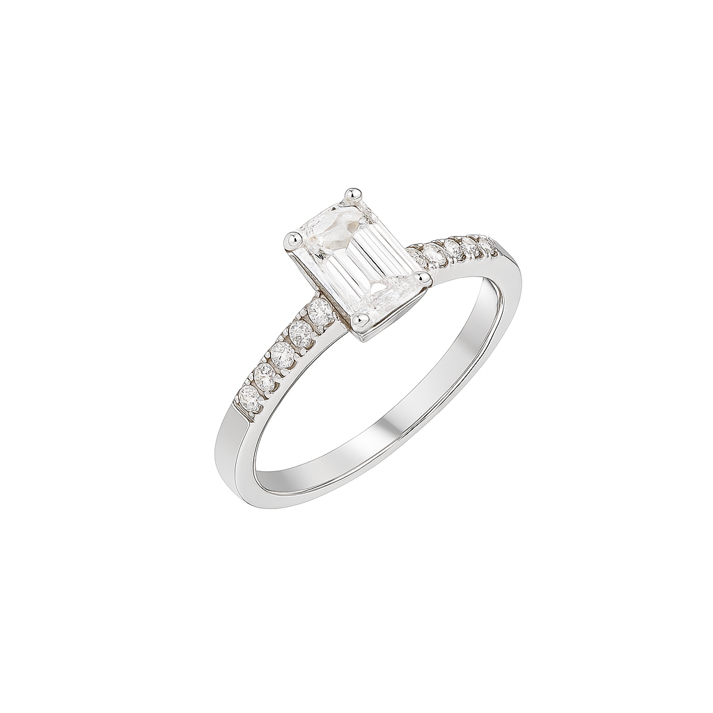 Elegant emerald-cut moissanite engagement ring in 925 sterling silver with pavé-set side stones. Features a brilliant D-color moissanite center stone offering diamond-like sparkle and clarity. Perfect as an engagement or anniversary ring, ethically crafted and ideal for everyday luxury wear