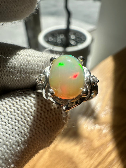 Elegant Ethiopian Well Opal Ring for Women in 925 Sterling Silver, featuring a vibrant opal with fiery play-of-color, perfect as an October birthstone jewelry piece or a meaningful gift.