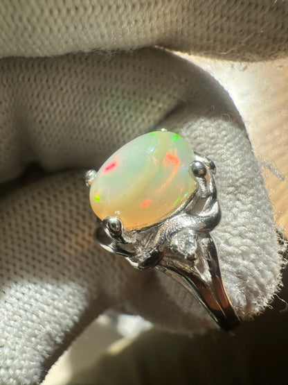 Elegant Ethiopian Well Opal Ring for Women in 925 Sterling Silver, featuring a vibrant opal with fiery play-of-color, perfect as an October birthstone jewelry piece or a meaningful gift.