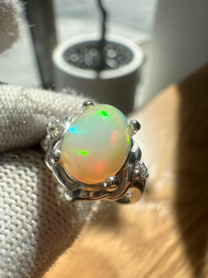 Elegant Ethiopian Well Opal Ring for Women in 925 Sterling Silver, featuring a vibrant opal with fiery play-of-color, perfect as an October birthstone jewelry piece or a meaningful gift.