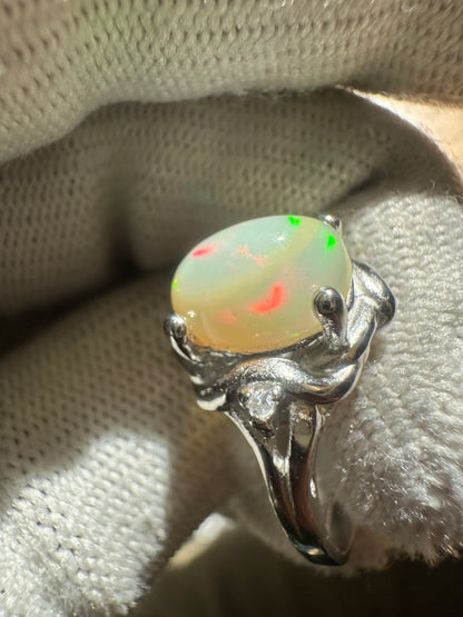 Elegant Ethiopian Well Opal Ring for Women in 925 Sterling Silver, featuring a vibrant opal with fiery play-of-color, perfect as an October birthstone jewelry piece or a meaningful gift.