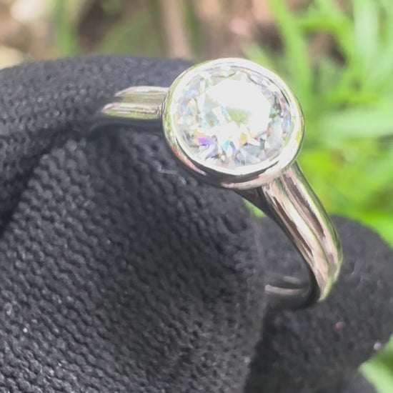 Shop this 1ct D Color Moissanite Solitaire Ring in S925 silver, white gold plated, GRA certified – perfect engagement or gift ring for her