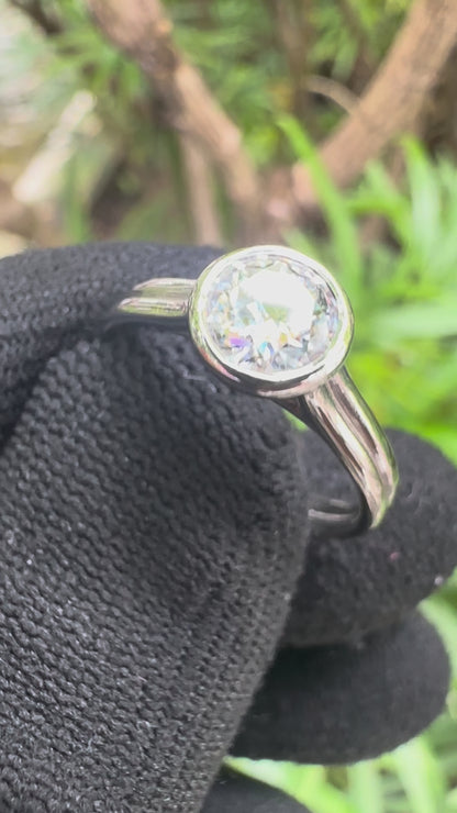 Shop this 1ct D Color Moissanite Solitaire Ring in S925 silver, white gold plated, GRA certified – perfect engagement or gift ring for her