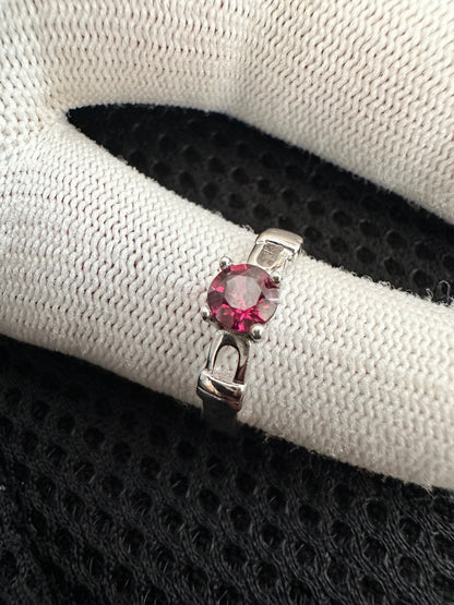 October's birthstone shines bright in this stunning silver ring with a Rubellite Tourmaline gemstone.